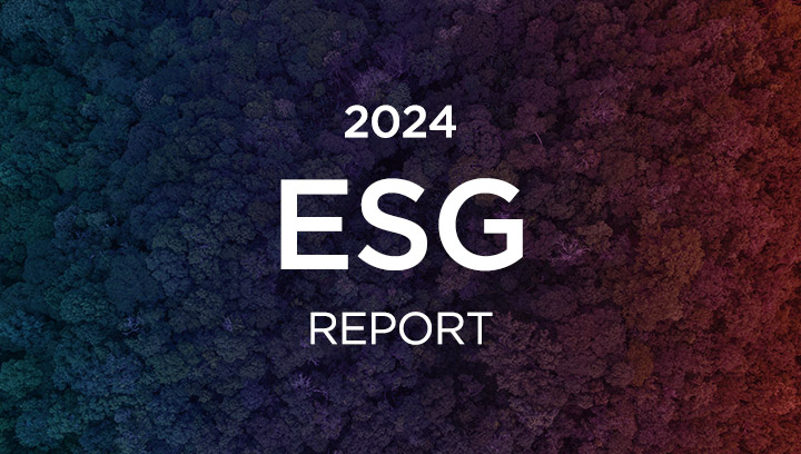 Lady holding tablet viewing DN's 2024 ESG Report